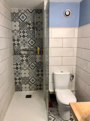 a bathroom with a toilet and a shower at Design loft in Chamonix Center in Chamonix-Mont-Blanc