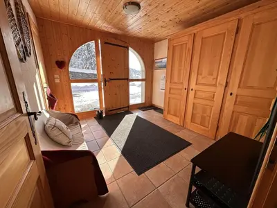 a snow covered city with a mountain in the background at Chalet 4 chambres, 9 pers, pied des pistes, garage 2 voitures - FR-1-572-279 in Arâches-la-Frasse