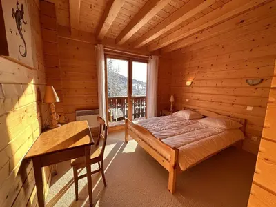 a small room with a couch and a window at Chalet 4 chambres, 9 pers, pied des pistes, garage 2 voitures - FR-1-572-279 in Arâches-la-Frasse