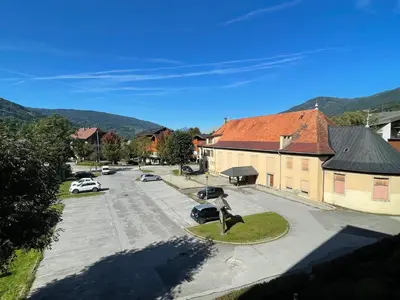 an overhead view of a parking lot with cars parked at Studio familial pour 4 personnes avec parking à Samoëns - FR-1-629-122 in Samoëns