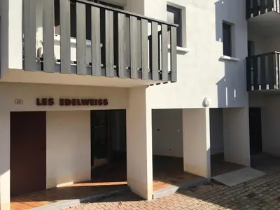 a building with a staircase on the side of it at Studio familial pour 4 personnes avec parking à Samoëns - FR-1-629-122 in Samoëns