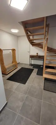 a room with a loft bed and a tiled floor at Magnifique Chalet neuf 8 pers, 800 m télécabine Princesse Megeve in Combloux