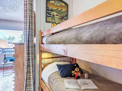 a living room with a table with bowls on it at Studio Les Collybies by Interhome in Saint-Gervais-les-Bains