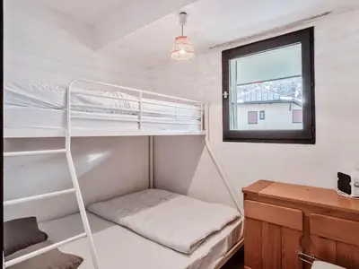 a view from the balcony of a town in the snow at Apartment La Comtesse-10 by Interhome in Saint-Gervais-les-Bains