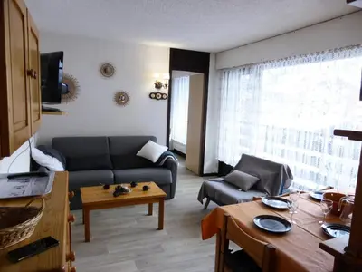 a living room with a couch and a table at Résidence Bel'aval - Bel Aval 195 MAE-6364 in Les Contamines-Montjoie