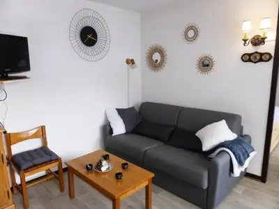 a living room with a couch and a table at Résidence Bel'aval - Bel Aval 195 MAE-6364 in Les Contamines-Montjoie