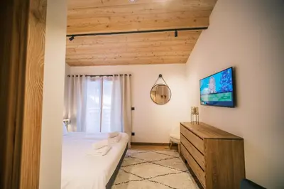a laundry room with a washing machine and a sink at Loft Zodiak -Centre Ville 4 Chambres Vue in Les Houches