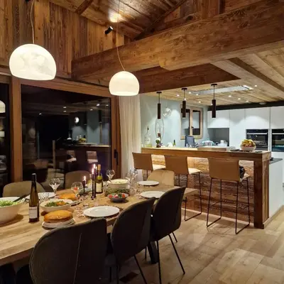a dining room with a table and chairs at CHALET UTOPIA in Saint-Gervais-les-Bains
