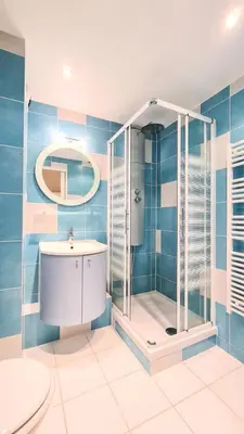 a bathroom with a shower and a toilet and a sink at Résidence Andromede - Studio entièrement rénové · Proche des pistes MAE-8254 in Magland