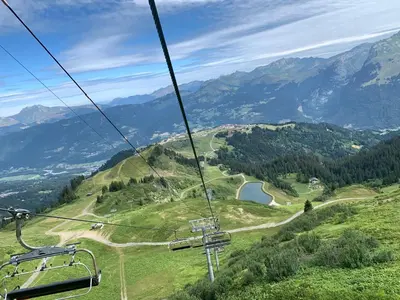 a gondola ride up a mountain with a valley at Samoens 1600, ski au pied in Samoëns