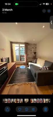 a view of a living room with a couch at Le Sasha in Chamonix-Mont-Blanc