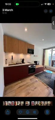 a kitchen with a sink and a stove at Le Sasha in Chamonix-Mont-Blanc