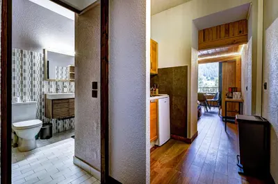 a bathroom with a toilet and a sink in a room at Superbe appartement hyper-centre in Chamonix-Mont-Blanc