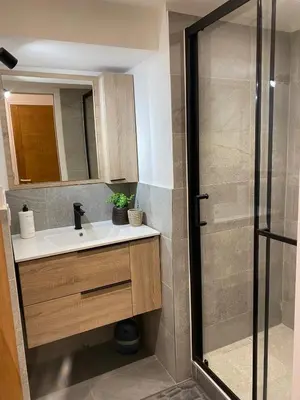 a bathroom with a sink and a shower at Mer de Glace in Chamonix-Mont-Blanc