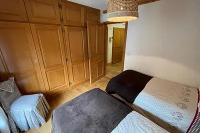 a bathroom with a shower and a sink and a washing machine at Large apartment in Chamonix - close to the slopes in Chamonix-Mont-Blanc
