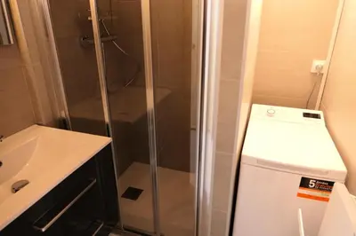 a shower with a glass door next to a sink at Résidence Hameau De Coterat - Hameau de Coterat 11 MAE-2524 in Saint-Gervais-les-Bains