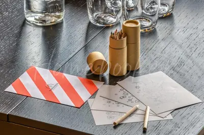 a table with some stationery on top of it at Yupik in Megève
