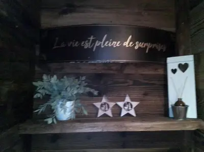a shelf with four stars and a sign on it at Amour & Chocolat in Sixt
