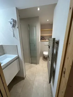 a bathroom with a sink and a toilet at Residencecalou in Saint-Gervais-les-Bains