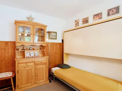 a small kitchen with a sink and a microwave at Apartment Castel des Roches C4 by Interhome in Saint-Gervais-les-Bains