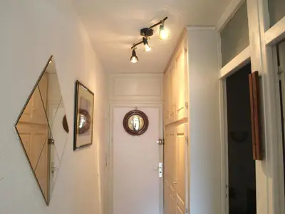 a pink bathroom with a sink and a mirror at Apartment Castel des Roches C4 by Interhome in Saint-Gervais-les-Bains