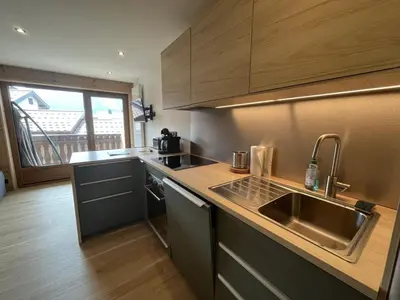 a kitchen with a sink and a counter top at Charmant Studio-Cabine 4 pers, Centre-Village, Balcon Ouest, à 600m des Pistes - FR-1-572-281 in Arâches-la-Frasse