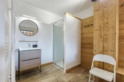 a bathroom with a sink and a mirror at Appartement Flégère et Golf - Happy Rentals in Chamonix-Mont-Blanc