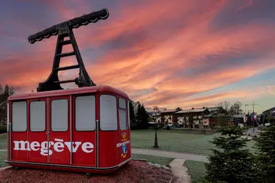 a red trolley car with a pole on top of it at Studio l'Orée - City centre - Megève in Megève