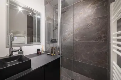 a bathroom with a sink and a shower at Studio l'Orée - City centre - Megève in Megève