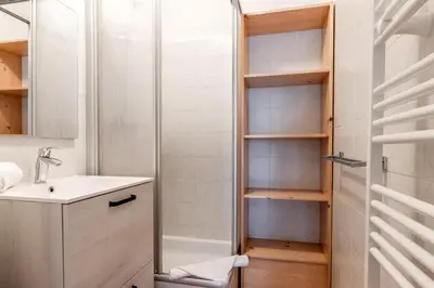 a bathroom with a shower and a sink at Lilas - Awesome view of the Mont-Blanc Range in Les Houches