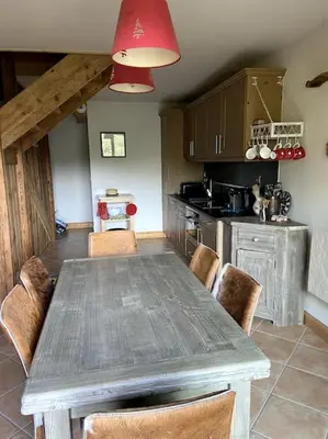 a bedroom with a large bed with two pillows on it at Three bedroom Apartment, Samoens, Grand Massif in Samoëns