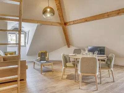 a dining room with a table and chairs at Studio cosy avec mezzanine, proche centre et télécabine - 2 pers. - FR-1-663-20 in Saint-Gervais-les-Bains