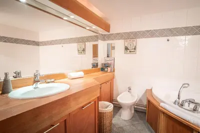 a bathroom with a sink and a toilet at Chalet Vorgeats 2 - 6 pers - Au pied de la Flégère - Golf - UTMB in Chamonix-Mont-Blanc