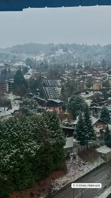 a view of a city with trees and buildings at Duplex St Gervais rooftop - 500m des télécabines in Saint-Gervais-les-Bains